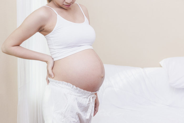 ısıtma yastığı kullanarak hamilelik sırasında sırt ağrısı
